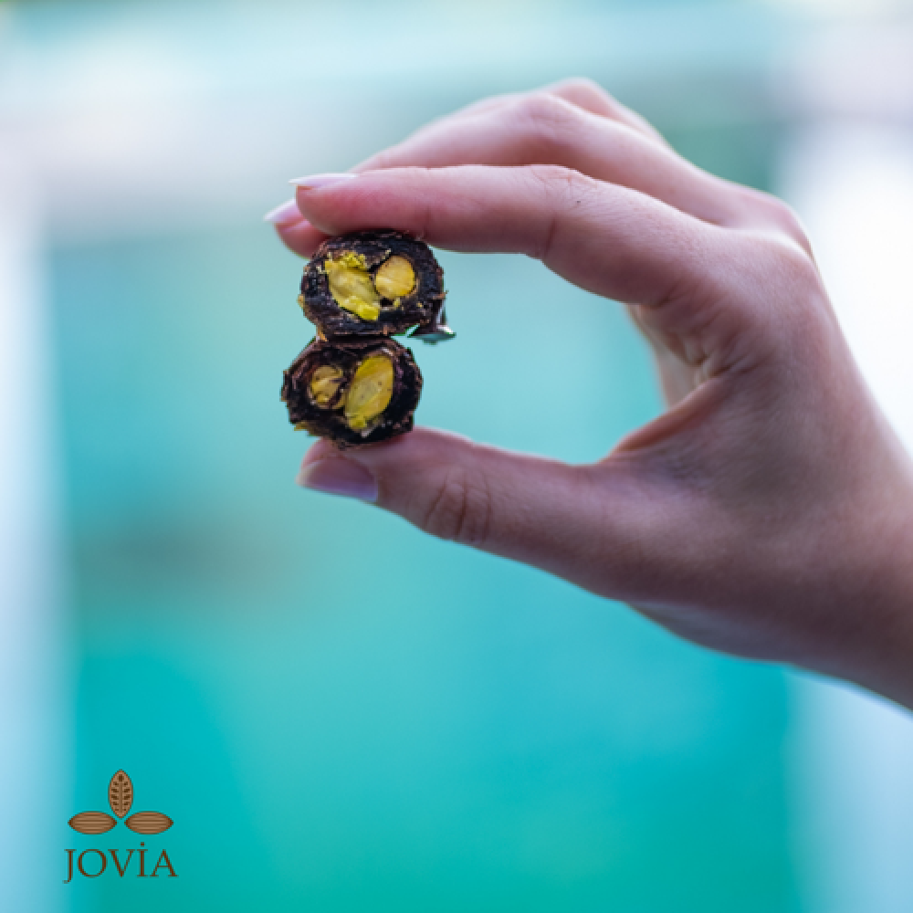 %100 bitter çikolata kaplı Antep fıstığı dolgulu organik hurma, şekersiz vegan atıştırmalık